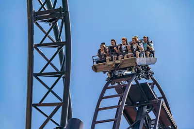 Guests on SAW The Ride before the drop