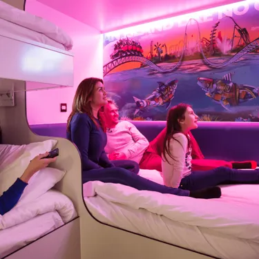 Thorpe Shark Cabins, family in a room