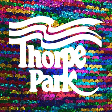 Old logo in front of sequins