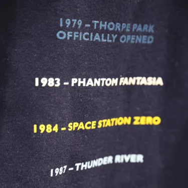 Thorpe Park 40th Anniversary Jacket With Timeline On Back Closeup
